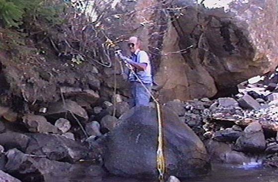 Big rock being moved out of a dredge hole